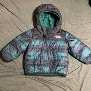 Reversible north face jacket. Size: 12 months